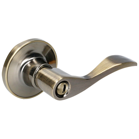 Manija tubular curva función baño, latón antiguo, llave estándar, blíster. Lock